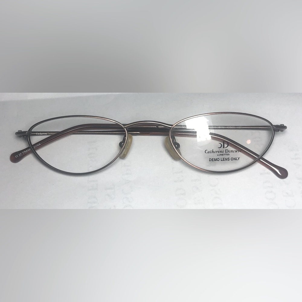 Catherine Deneuve half eye frame